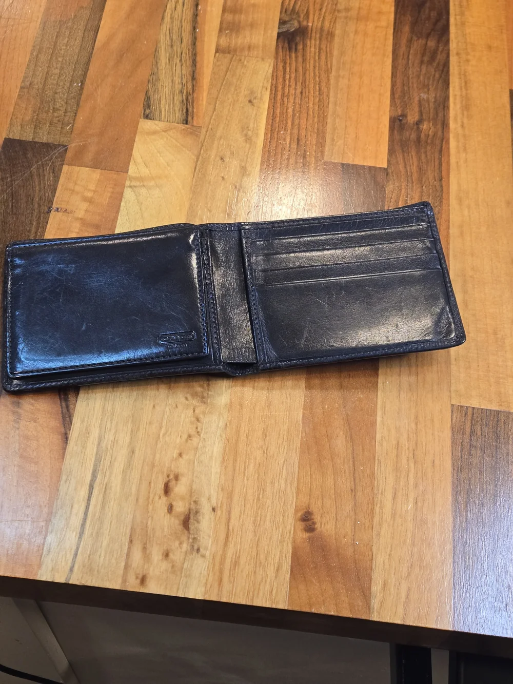 ​Coach Heritage Polished Leather Bifold Wallet – Glossy Black